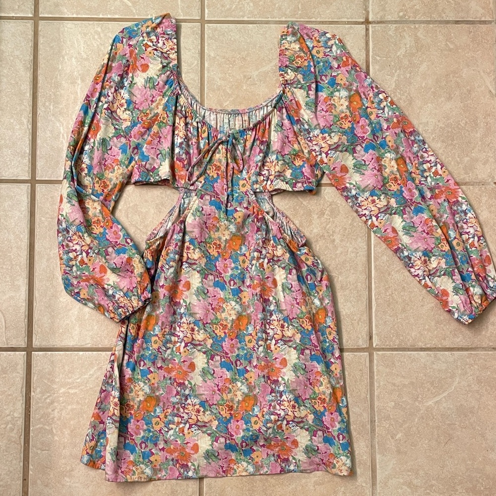 Multi-colored side cut out mini dress.